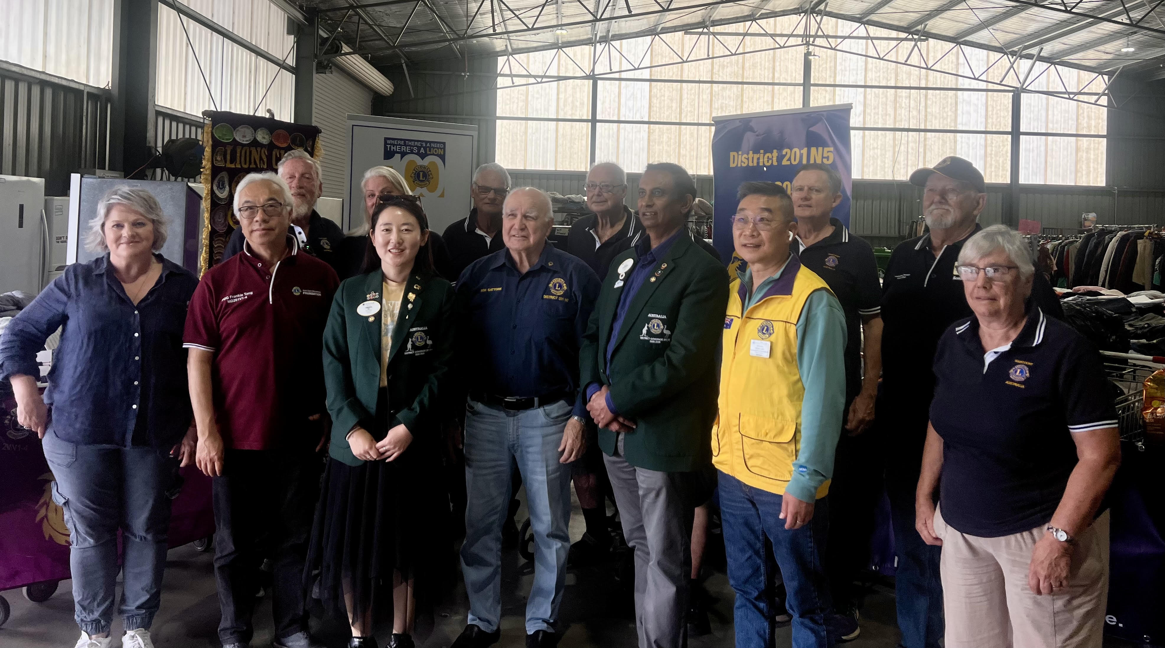 Lions Club members from multiple districts convene at Castlemaine Distribution Centre for a major donation.