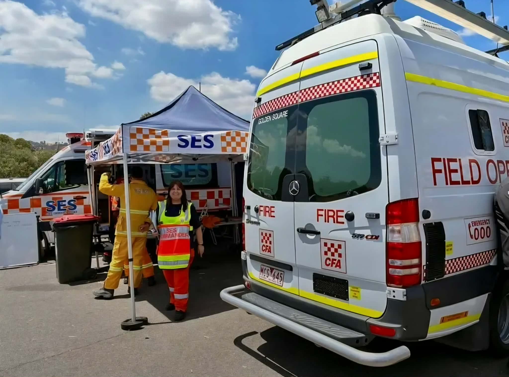 SES and CFA vehicles at the staging area.